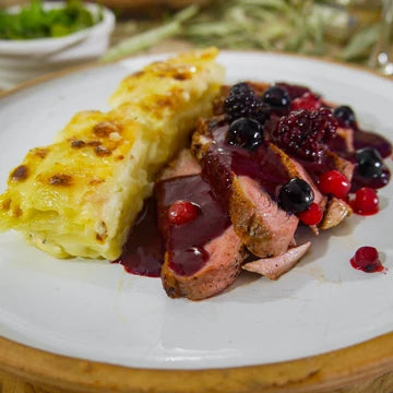 Duck Breast with Dauphinois Potatoes and a Verjuice Red Berry Reduction